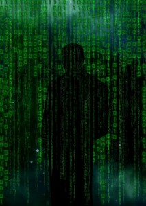 dark shadow of a a person with the matrix background